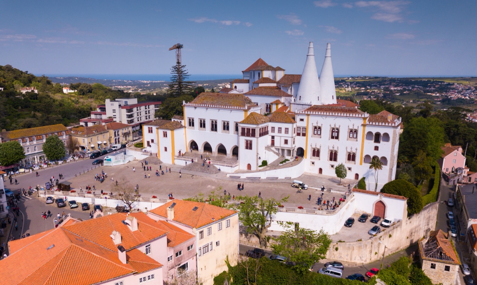 Aerial view of Sintra's old town and the National Palace with its two white chimneys